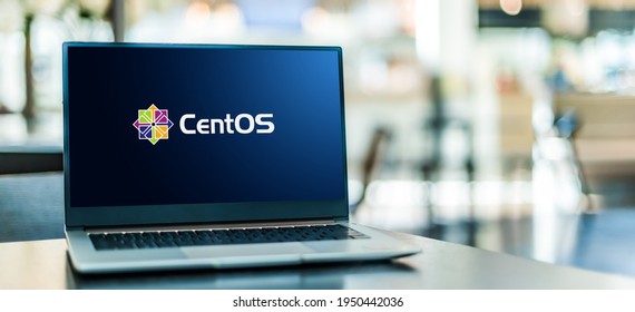 POZNAN, POL - MAR 15, 2021: Laptop Computer Displaying Logo Of CentOS, A Linux Distribution That Provides A Community-supported Computing Platform Functionally Compatible Red Hat Enterprise Linux