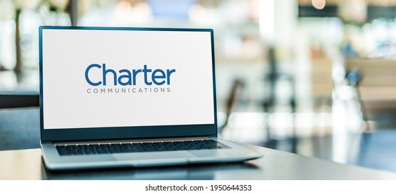 POZNAN, POL - NOV 12, 2020: Laptop computer displaying logo of Charter Communications, a telecommunications and mass media company with services branded as Charter Spectrum