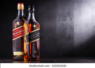 POZNAN, POL - NOV 15, 2018: Bottles of Johnnie Walker, the most widely distributed brand of blended Scotch whisky in the world with sales of over 130 million bottles a year.