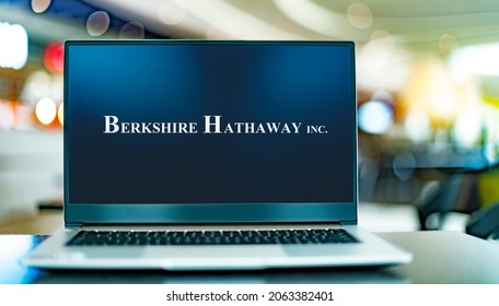 POZNAN, POL - OCT 1, 2021: Laptop computer displaying logo of Berkshire Hathaway Inc., an American multinational conglomerate holding company headquartered in Omaha, Nebraska, USA