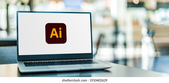 POZNAN, POL - SEP 23, 2020: Laptop computer displaying logo of Adobe Illustrator, a vector graphics editor developed and marketed by Adobe Inc