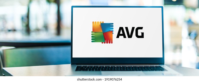 POZNAN, POL - SEP 23, 2020: Laptop computer displaying logo of AVG AntiVirus, a line of antivirus software developed by AVG Technologies, a subsidiary of Avast