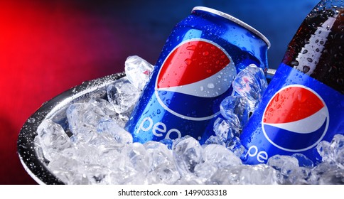 POZNAN, POL - SEP 5, 2019: Bottle and can of Pepsi, a carbonated soft drink produced and manufactured by PepsiCo. The beverage was created and developed in 1893 under the name Brad's Drink