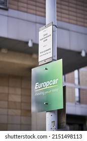 POZNAN, POLAND - Apr 06, 2022: A green Europcar company rental car board of a parking lot 