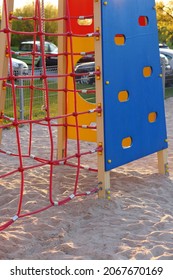 POZNAN, POLAND - Apr 23, 2015: Colorful Play Equipment With Ropes On The Sand On The Playground In The Polan District, Poznan, Poland