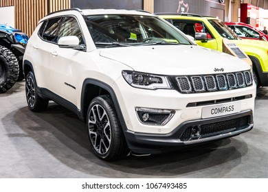 Poznan, Poland, April 05, 2018: metallic white Jeep Compass 4x4 compact crossover SUV at Poznan International Motor Show, Jeep is a brand of American automobiles