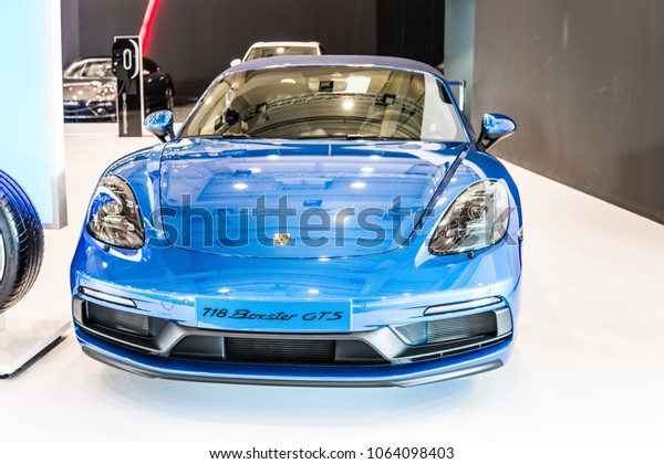 Poznan, Poland, April 05,\
2018: metallic blue Porsche 718 Boxster GTS at Poznan International\
Motor Show, cabrio, mid-engined two-seater sports cars built by\
Porsche