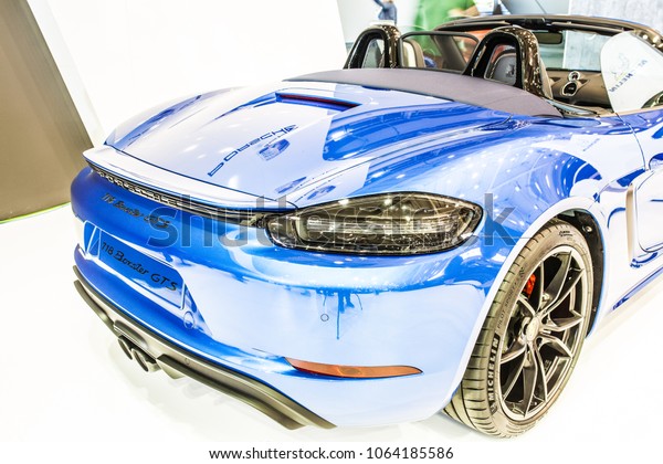 Poznan, Poland, April 05,\
2018: metallic blue Porsche 718 Boxster GTS at Poznan International\
Motor Show, cabrio, mid-engined two-seater sports cars built by\
Porsche