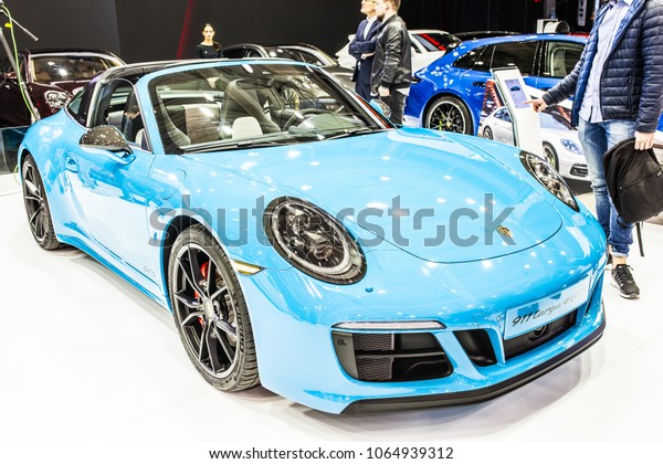 Poznan, Poland,\
April 05, 2018: metallic Caribbean blue Porsche 911 Targa 4 GTS\
Type 991 at Poznan International Motor Show, cabrio mid-engined\
two-seater sports cars built by\
Porsche