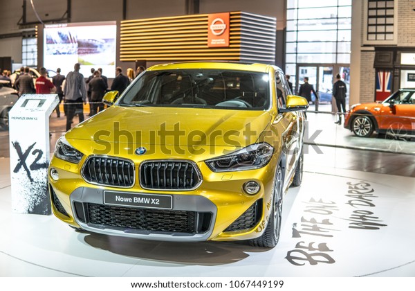 Poznan, Poland, April 05, 2018: metallic gold BMW X2 at\
Poznan International Motor Show, manufactured and marketed by BMW\
