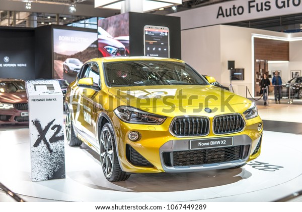 Poznan, Poland, April 05, 2018: metallic gold BMW X2 at\
Poznan International Motor Show, manufactured and marketed by BMW\
