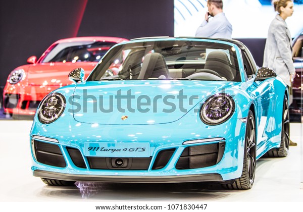 Poznan, Poland,
April 05, 2018: metallic Caribbean blue Porsche 911 Targa 4 GTS
Type 991 at Poznan International Motor Show, cabrio mid-engined
two-seater sports cars built by
Porsche
