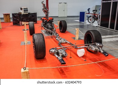 Poznan, Poland, April 06-09, 2017: MOTOR SHOW, International Car Fair: Kalinski Exhaust Systems For Motorcycles, Cars. Auto Model With Engine, Tires And Exhaust System