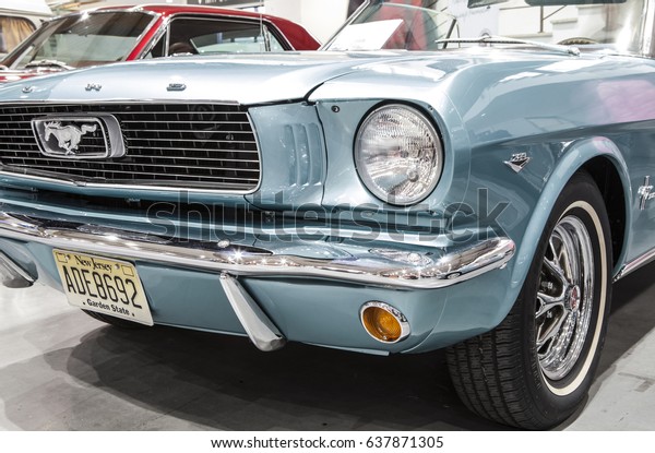 POZNAN, POLAND - APRIL 14,\
2016: Old Ford Mustang on static display at the International Fair\
in Poznan