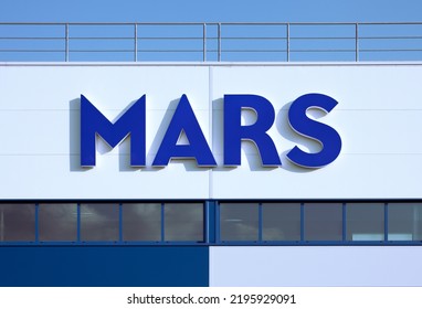 Poznan, Poland - August 27, 2022. Mars, Inc. Logo On Its Chewing Gum Factory. Mars Is An American Multinational Manufacturer Of Confectionery, Pet Food, And Other Food Products.