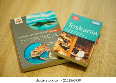 POZNAN, POLAND - Feb 19, 2022: A Tuscany And Croatia Travel Guides On A Wooden Table 