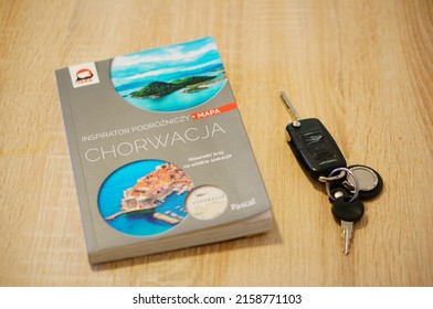 POZNAN, POLAND - Feb 20, 2022: A Travel Guide About Croatia Next To Car Keys On A Table 