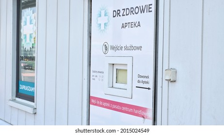 Poznan Poland - July 27, 2021: Backdoor Entrance To Pharmacy Dr. Zdrowie In Polish Mall M1. Door With Small Window On Back Of Drugstore In Poland. 