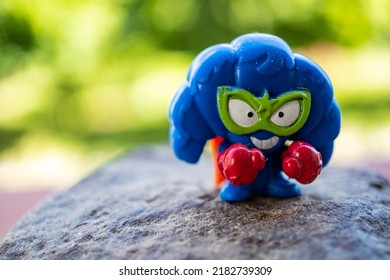 POZNAN, POLAND - Jun 10, 2022: A Blue Croissant Toy Figurine From The Heroes Team Standing On A Rock