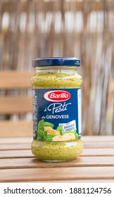 POZNAN, POLAND - Jun 28, 2016: Barilla Green Pesto In A Glass Jar On A Table