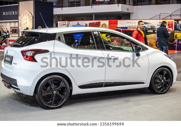 Poznan,\
Poland, March 28, 2019: metallic white Nissan Micra at Poznan\
International Motor Show, Fifth generation, K14, compact auto\
produced by Japanese car manufacturer\
Nissan