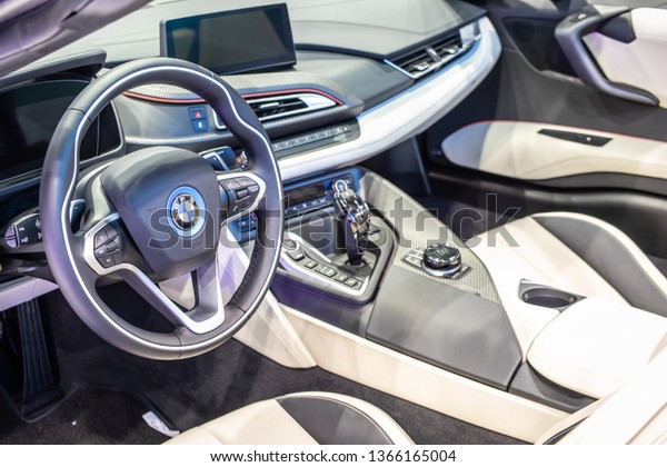 Poznan, Poland, March 28, 2019: inside electric\
BMW i8 roadster at Poznan International Motor Show, eco friendly\
car manufactured and marketed by BMW, control board, steering\
wheel, upholstery,\
seats,