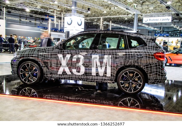 Poznan, Poland, March 28, 2019: BMW X3 M Competition
with camouflage at Poznan International Motor Show, Third
generation, G01, compact luxury crossover SUV manufactured by
German automaker BMW 