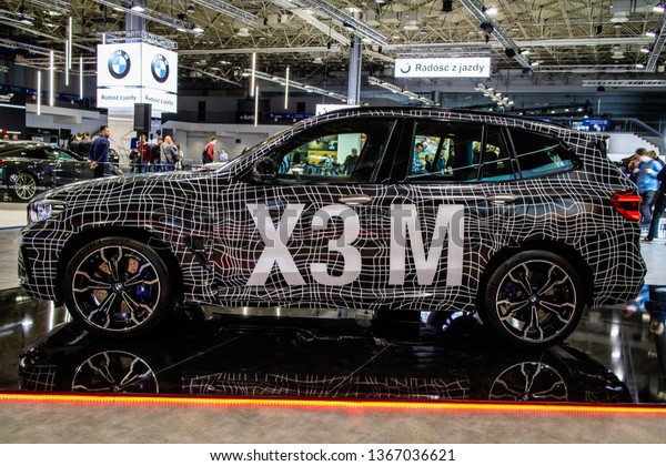 Poznan, Poland, March 28, 2019: BMW X3 M Competition\
with camouflage at Poznan International Motor Show, Third\
generation, G01, compact luxury crossover SUV manufactured by\
German automaker BMW 