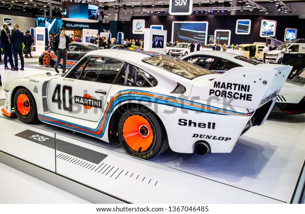 Poznan, Poland, March 28, 2019: Porsche 935\
1977 Baby racing bolid at Poznan International Motor Show, Porsche\
935/77 race car with Martini, Shell, Dunlop, Bosch, Bilstein\
advertisement