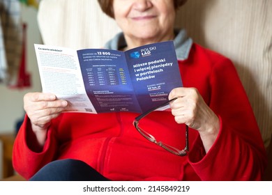 Poznan, Poland- March 3,2022: Illustrative Editorial Of A Unidentified Senior Woman Reading 