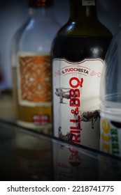 POZNAN, POLAND - Oct 11, 2022: A Vertical Closeup Of A Bottle Of Il Fuochista Red Barbecue Wine In A Fridge