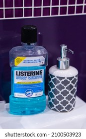 POZNAN, POLAND - Oct 27, 2018: A Vertical Sot Of Listerine Brand Mouth Wash Liquid And A Soap Bottle In A Bathroom