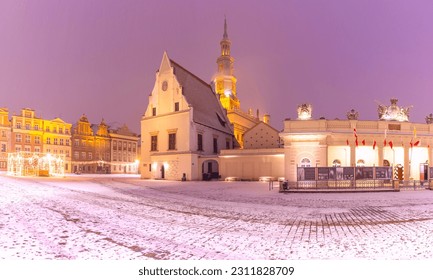 Poznan Town Hall on Old Market Square in Old Town in the snowy Christmas night, Poznan, Poland - Shutterstock ID 2311828709