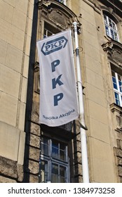 Poznan, Wielkopolskie / Poland - 04.29.2019: Logo Of Polish State Railways Placed On The Flag In Front Of The Company's Office In Poznan