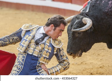 Pozoblanco, Spain - September 23, 2011: The Spanish Bullfighters enter chapel before starting bullfight, tradition ancestral in the world of bullfighting, rite typical in Bullring of Pozoblanco, Spain