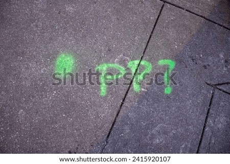 PP with dot and question mark in green on new york streets