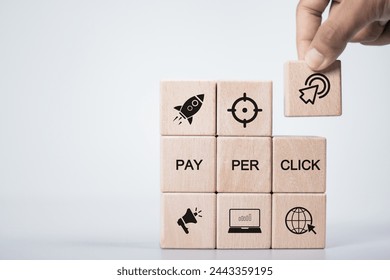 PPC, Pay per click concept. Advertising in Search Engine Platforms. Digital Marketing Strategies and Goals. Pay per click icon on wooden block.