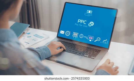 PPC - Pay Per Click concept. Businesswomen working on laptop, social network, SEO