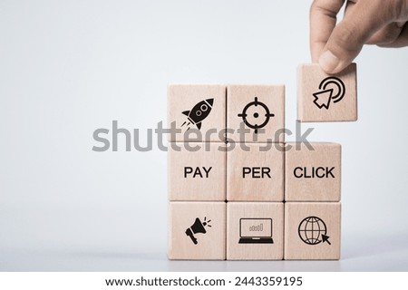 PPC, Pay per click concept. Advertising in Search Engine Platforms. Digital Marketing Strategies and Goals. Pay per click icon on wooden block.