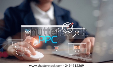 PPC - Pay Per Click concept. Businessman working on laptop, social network, SEO