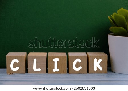 PPC Pay Per Click on wooden block PPC Pay Per Click text on dices on green background 