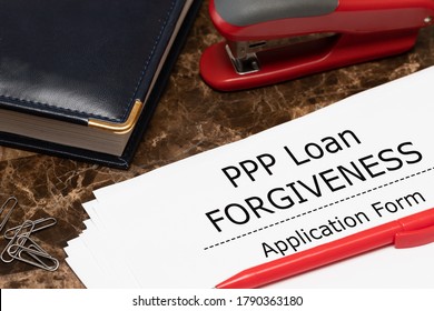 PPP Loan Forgiveness Text On Application Form Paper. Small Business Payroll Protection Program. Banking And Finance Concept