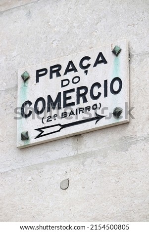 Praca do Comercio landmark square name sign in Lisbon, Portugal.