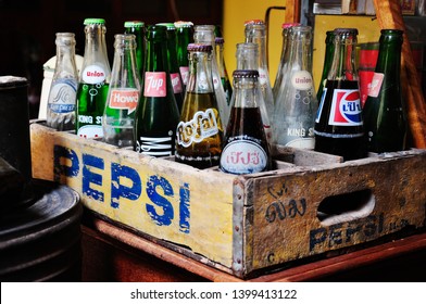 Prachin Buri, Thailand, Mar 27, 2010:Collection Of Vintage Soft Drinks That Have Not Yet Opened. These Bottles With 7up, Pepsi, Royal Crown, Suncrest, Union And Howd In Wooden Crates.