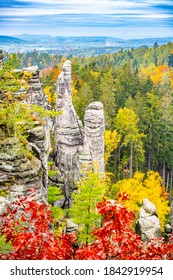 Prachov Rocks, Czech: Prachovske skaly, sandstone rock formation with colorful trees of autumn. View from Bohemian Paradise lookout point, Czech Republic. - Shutterstock ID 1842919954