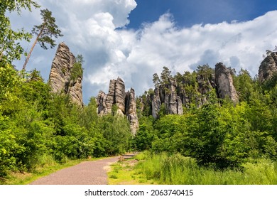 Prachov rocks (Prachovske skaly) in Cesky Raj region, Czech Republic. Sandstone rock formation in vibrant forest. Prachov Rocks, Czech: Prachovske skaly, in Bohemian Paradise, Czech Republic.