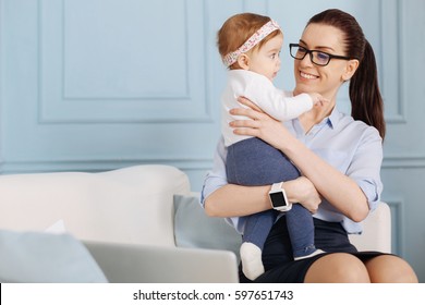 Practical experienced specialist enjoying her maternity leave