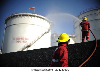 practice fireman extinguish oil spill petrochemical industrial.