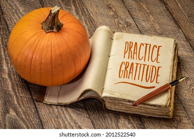 Practice Gratitude Inspirational Note - Handwriting In A Retro Journal With A Pumpkin Against Rustic Wood, Thanksgiving Theme