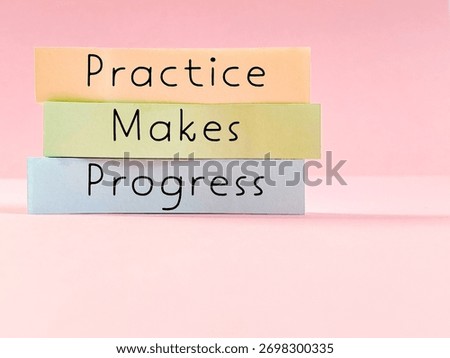 Practice makes progress text written on note paper with copy space background. Skills progression concept.